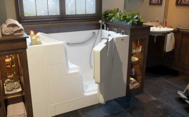 Wheelchair accessible walk-in tub with wide door opening for safe transfer